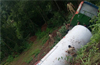 Kasargod : LPG tanker rolls into gorge ; driver, cleaner injured